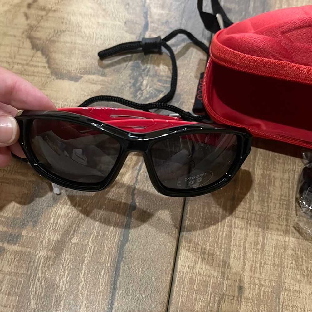 Youth Sunglasses. Car case. Cleaning rag. Strap attachments
